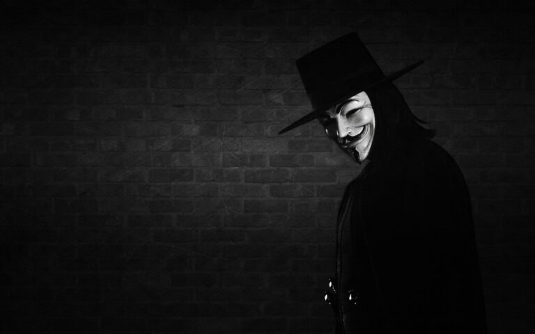 mascara de guy fawkes en fondo oscuro